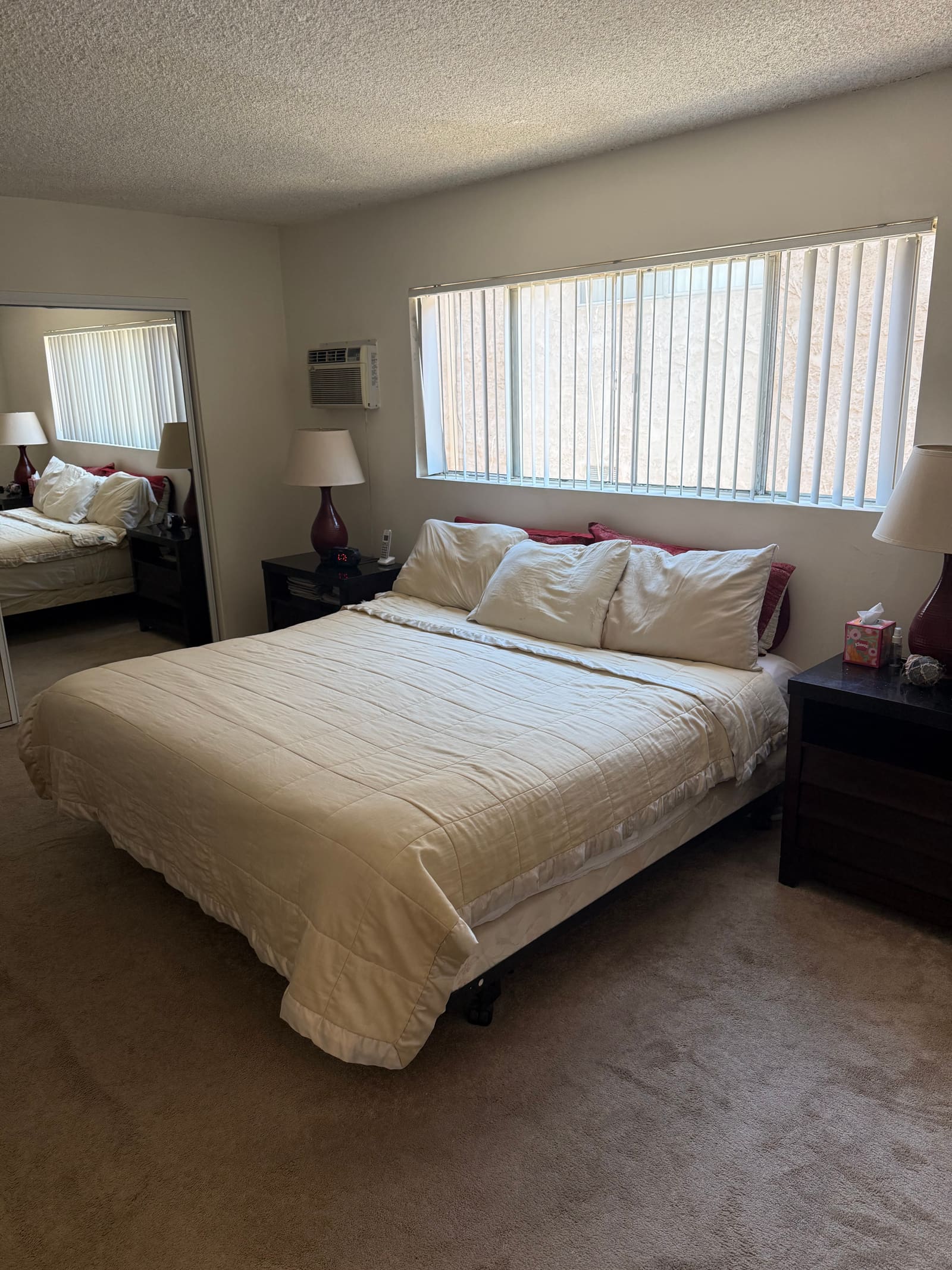 Neatly made bedroom in a Valley home.